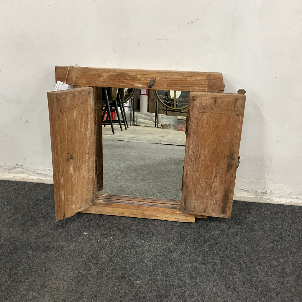 Miroir ancien en bois sculpté