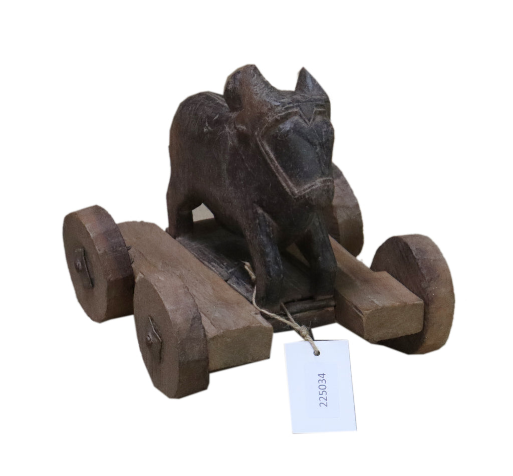 Cheval ancien sur roulettes en bois